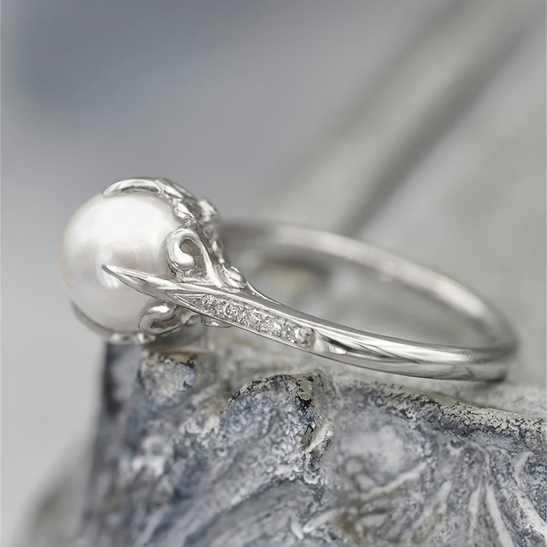 Thin ring with pearl and crystal