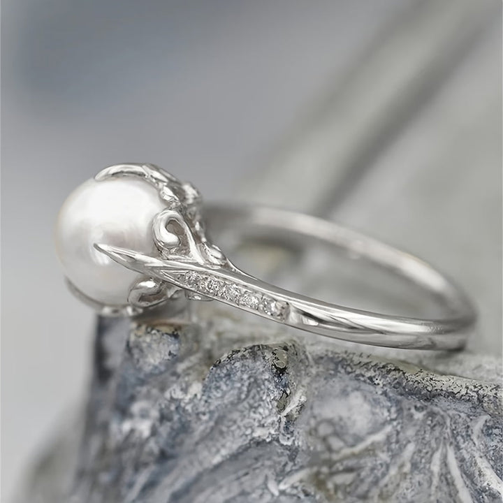 Thin ring with pearl and crystal