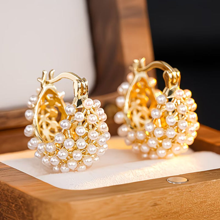 Wide hoop earrings with pearls