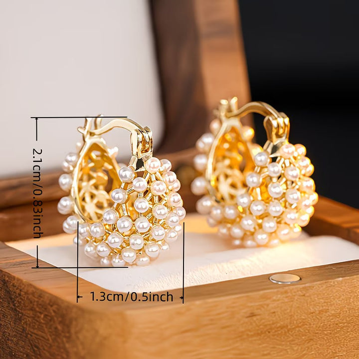 Wide hoop earrings with pearls
