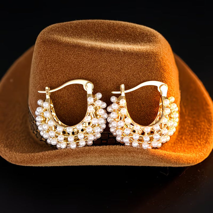 Wide hoop earrings with pearls